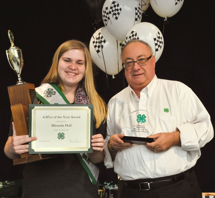 Miranda Hall receiving the 2017 Iosco County 4-Her of the Year award.