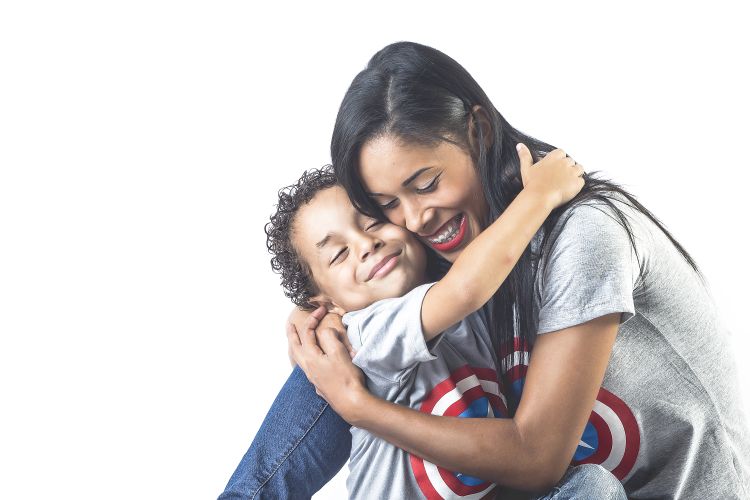 Mother and son smiling