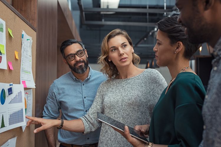 People discussing things at a public meeting.