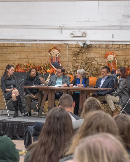 The panel members seated at Our Table.