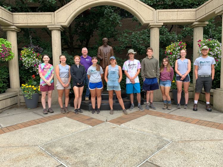 People standing in gardens