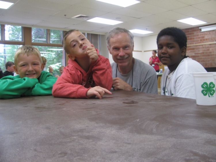 Talon and Tom (center) with two other youth at Michigan 4-H Mentoring Weekend.