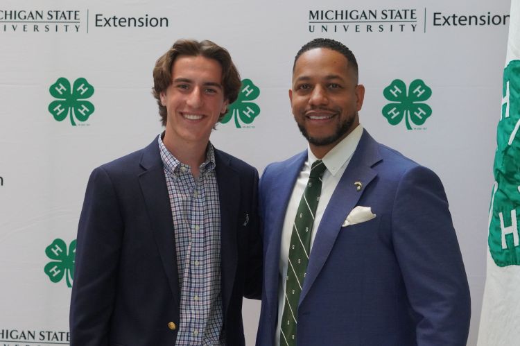 Two men posing together for a photo.