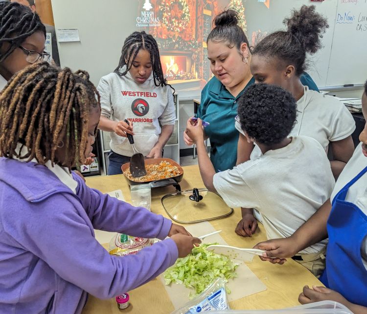 Students participating in a Cooking Matters for Kids class.