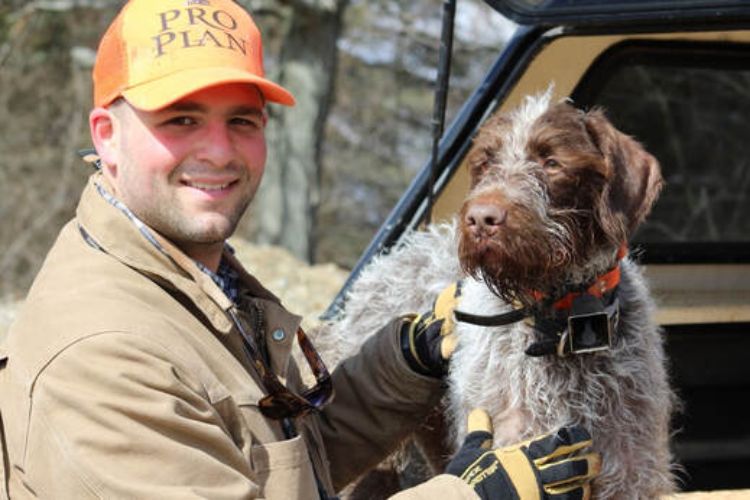 photo of Ben Schram and his dog