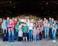 Westendorp family in front of barn.