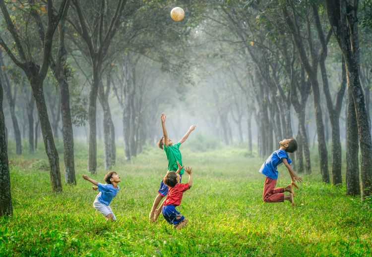 Boys playing with a ball