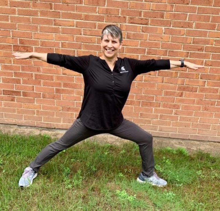 Yoga instructor Kendra Gibson showing a yoga pose.