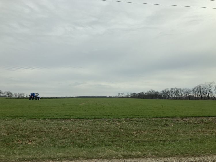 A sprayer in a field.