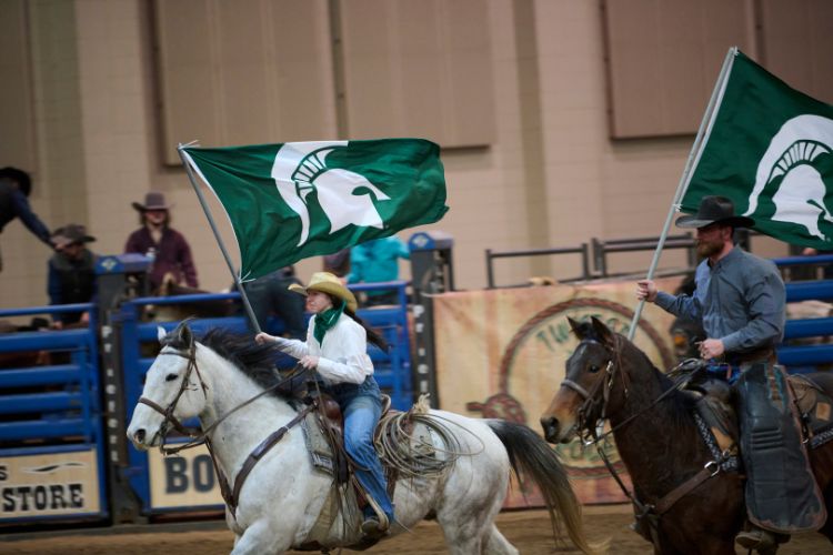 Image of a MSU Rodeo Club member riding a horse at the 2024 Spartan Stampede Rodeo