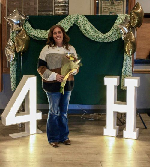 Ashley Foster between the letter's 4-H.