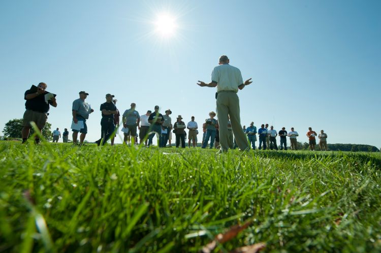 A researcher gives a field day presentation.