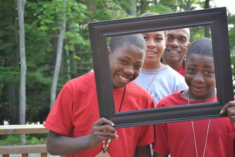 Mr. Wells with his mentoring match: Jimmy, Brandon and Ronell