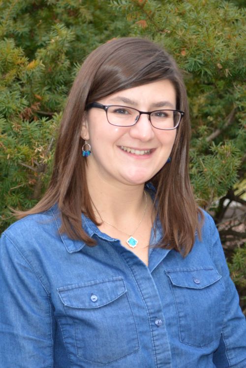 A headshot of a woman