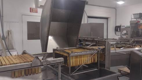 Photo of a the Pollinator Performance Center's honey extraction room.