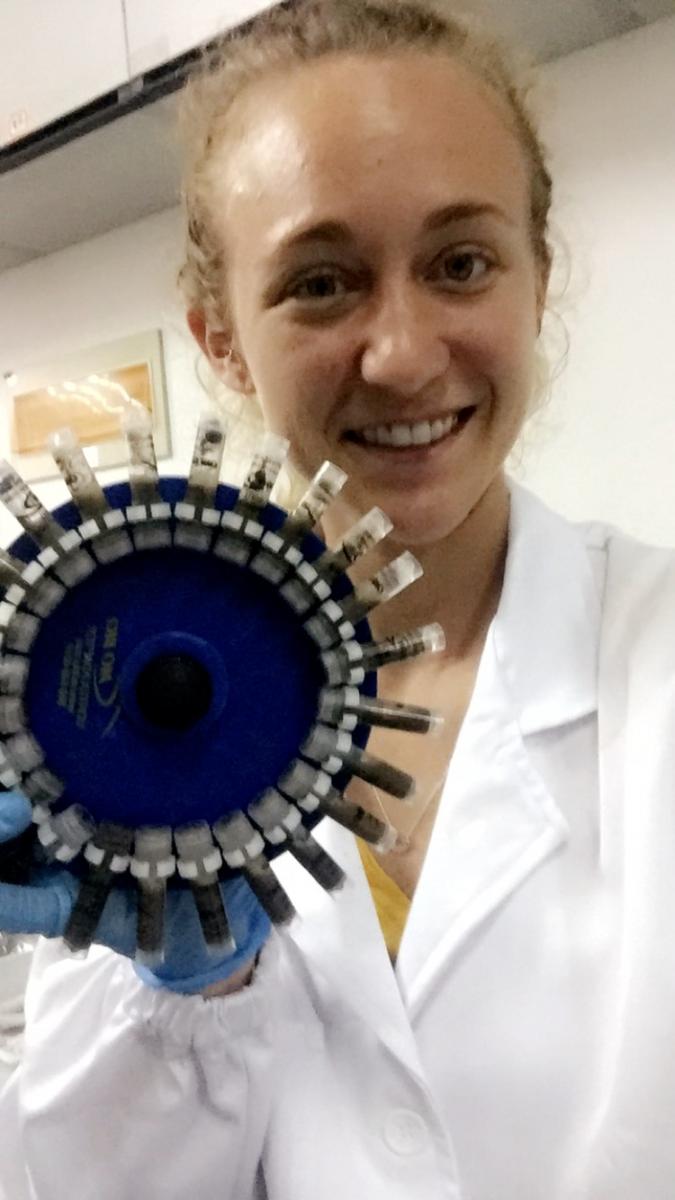 Anna with soil samples in centrifuge