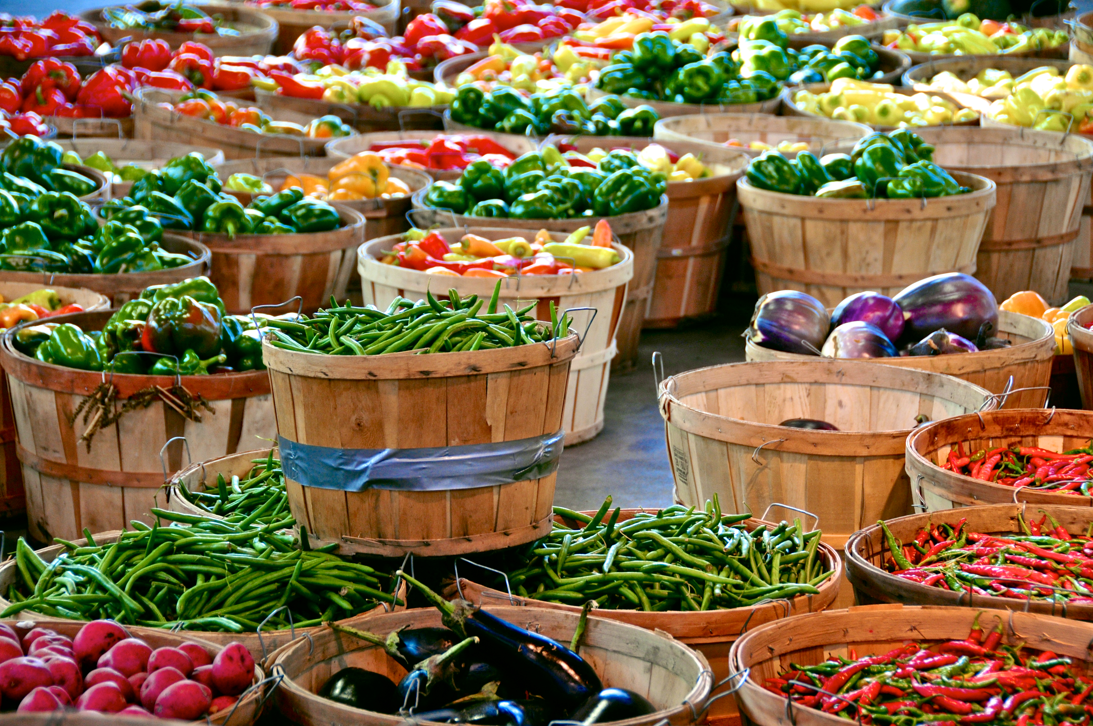 Baskets of fresh produce set out for display.
