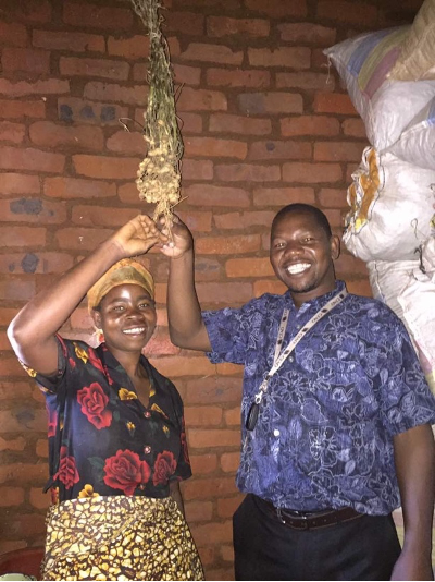 Dr. Regis Chikowo training farmer on seed production in Malawi