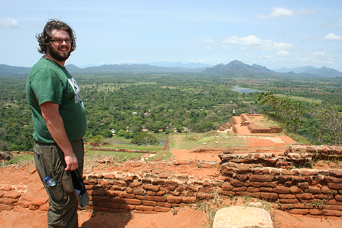 John Pajot standing on Lion Rock