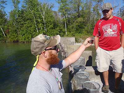 Kelley Smith holds a crawfish