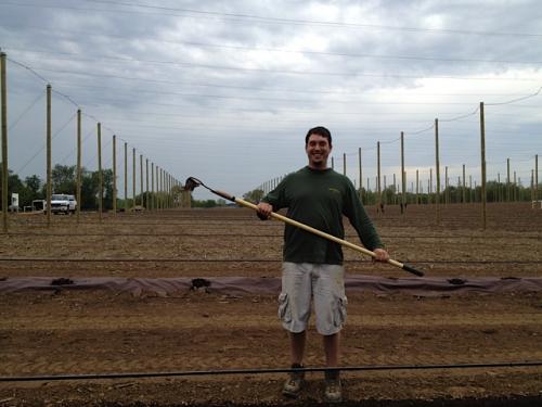 Marty Moga of Calhoun County&rsquo;s new High Five Hops Farm is pictured at Hop Head Farms&rsquo; 2012 spring planting event.