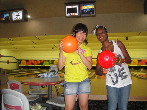 4-H members enjoy bowling together.